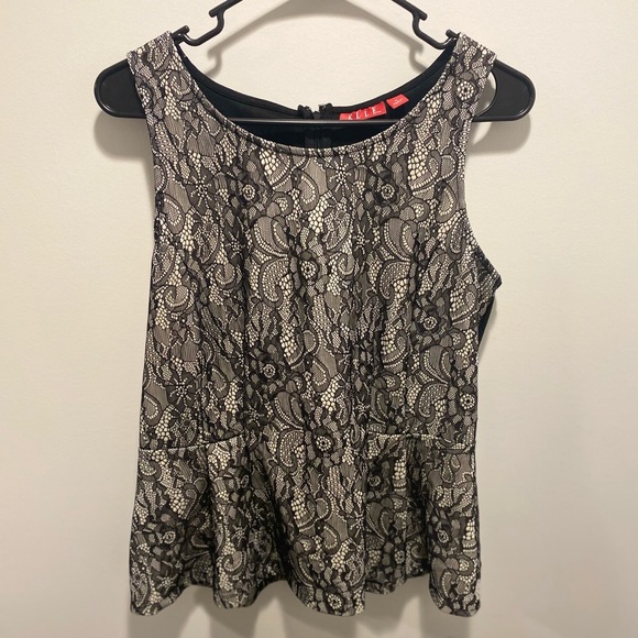 Elle Tops - Women’s Elle peplum style black top with lace front Size Medium